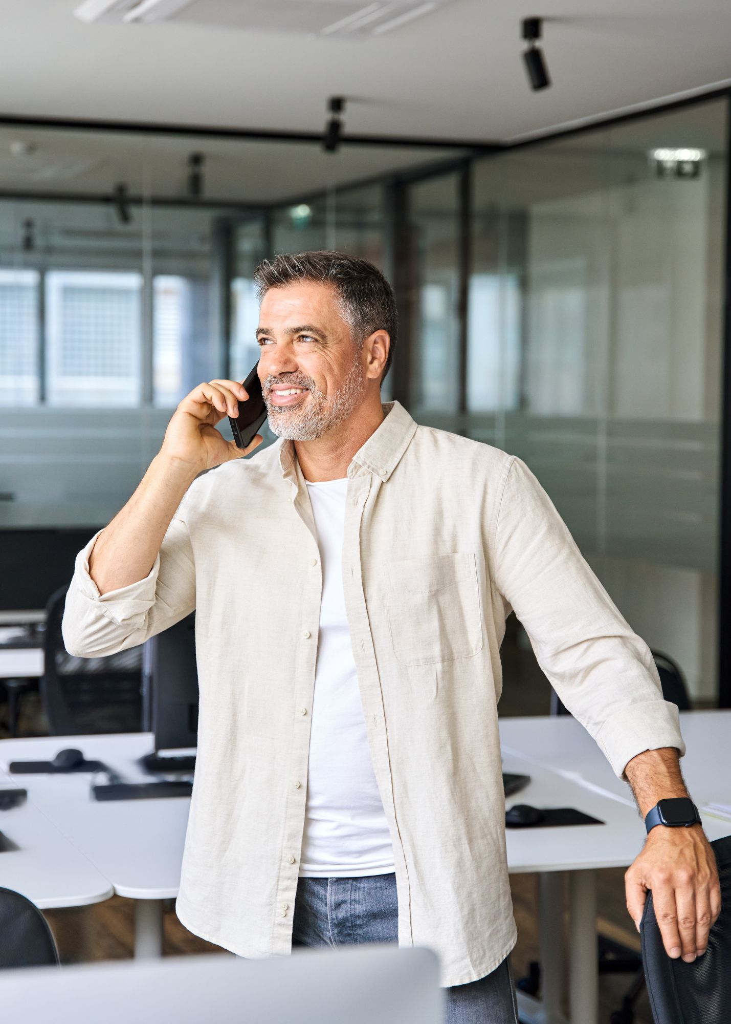 A happy employee on their smart phone